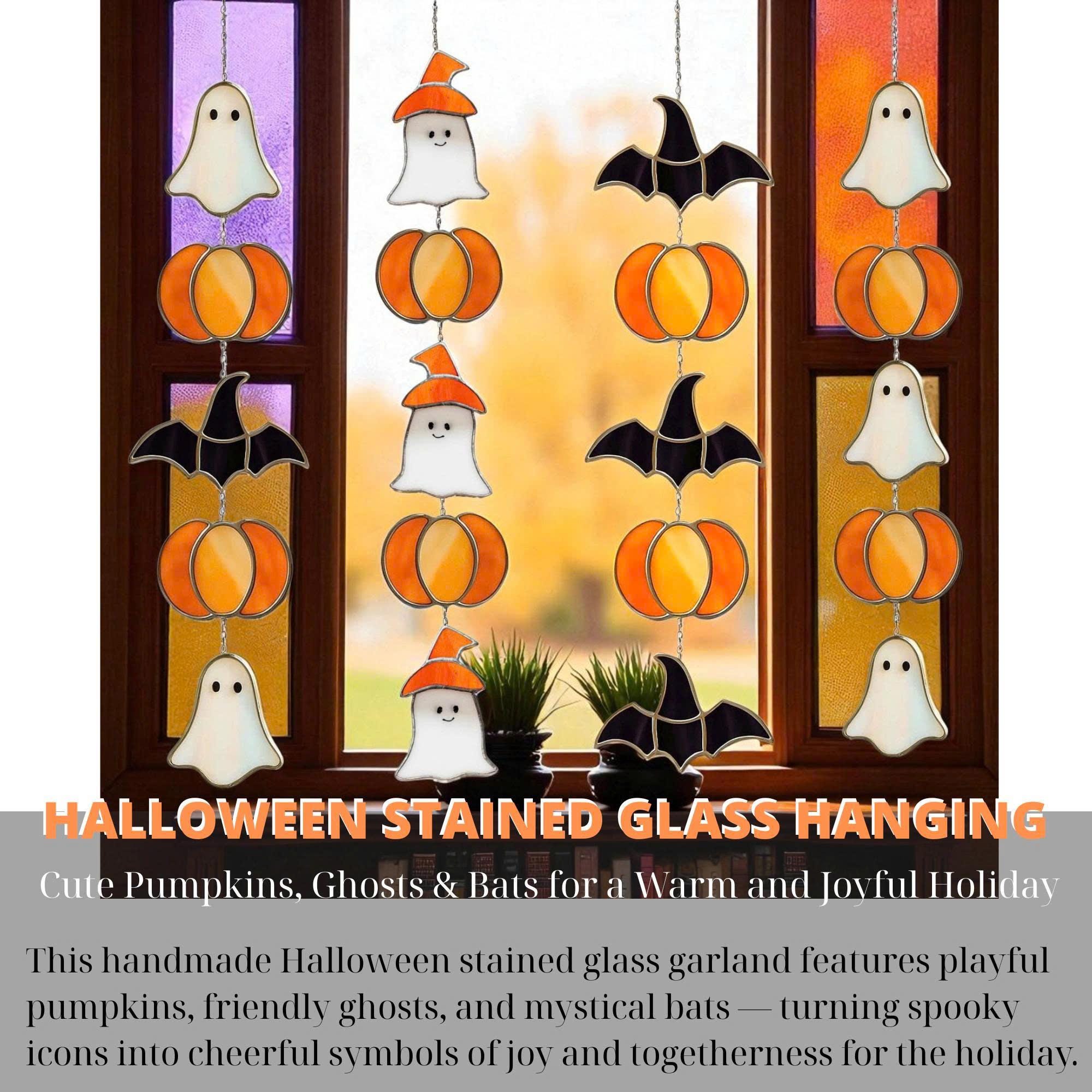 Handmade stained glass Halloween suncatcher featuring cute ghosts with witch hats and orange pumpkins, window hanging decoration