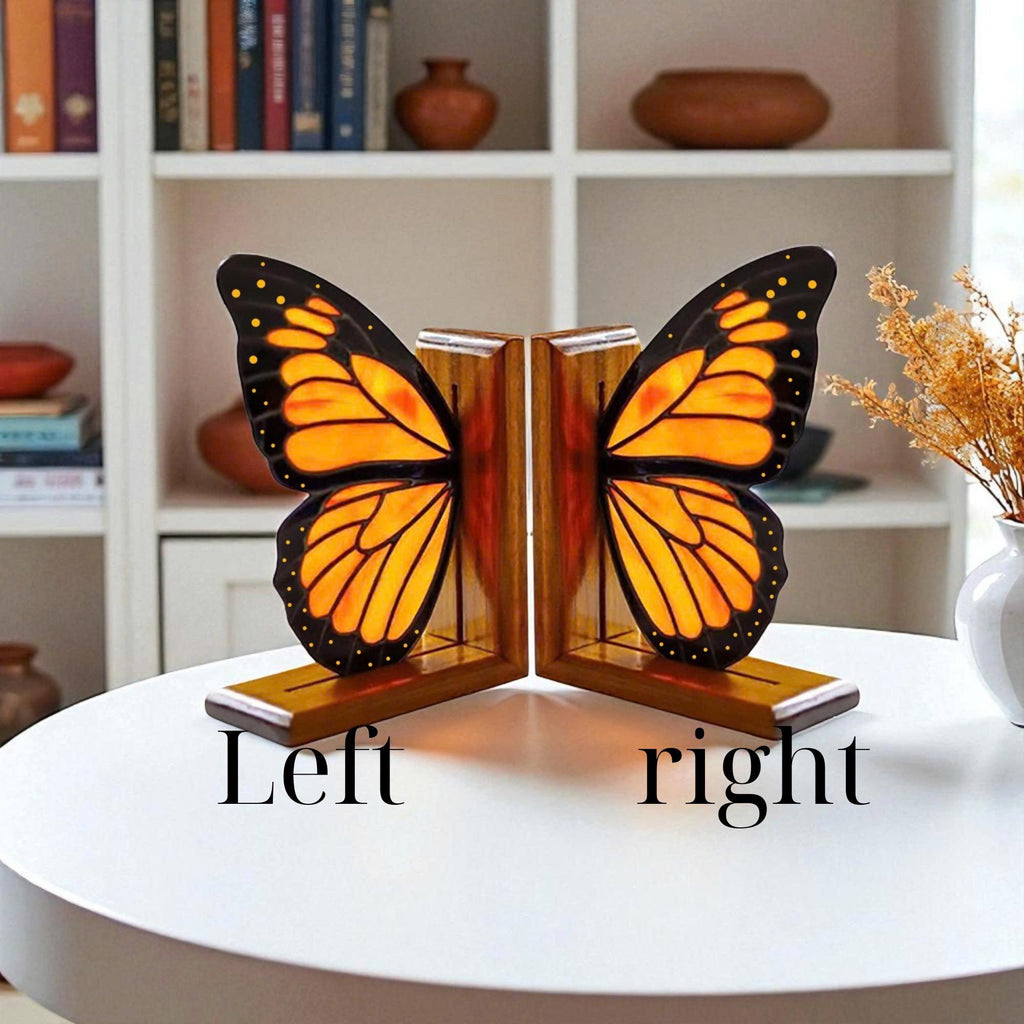 Handmade stained glass butterfly bookends with oak wood base, unique orange monarch wing design, decorative bookshelf decor and gift for book lovers.