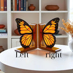 Handmade stained glass butterfly bookends with oak wood base, unique orange monarch wing design, decorative bookshelf decor and gift for book lovers.