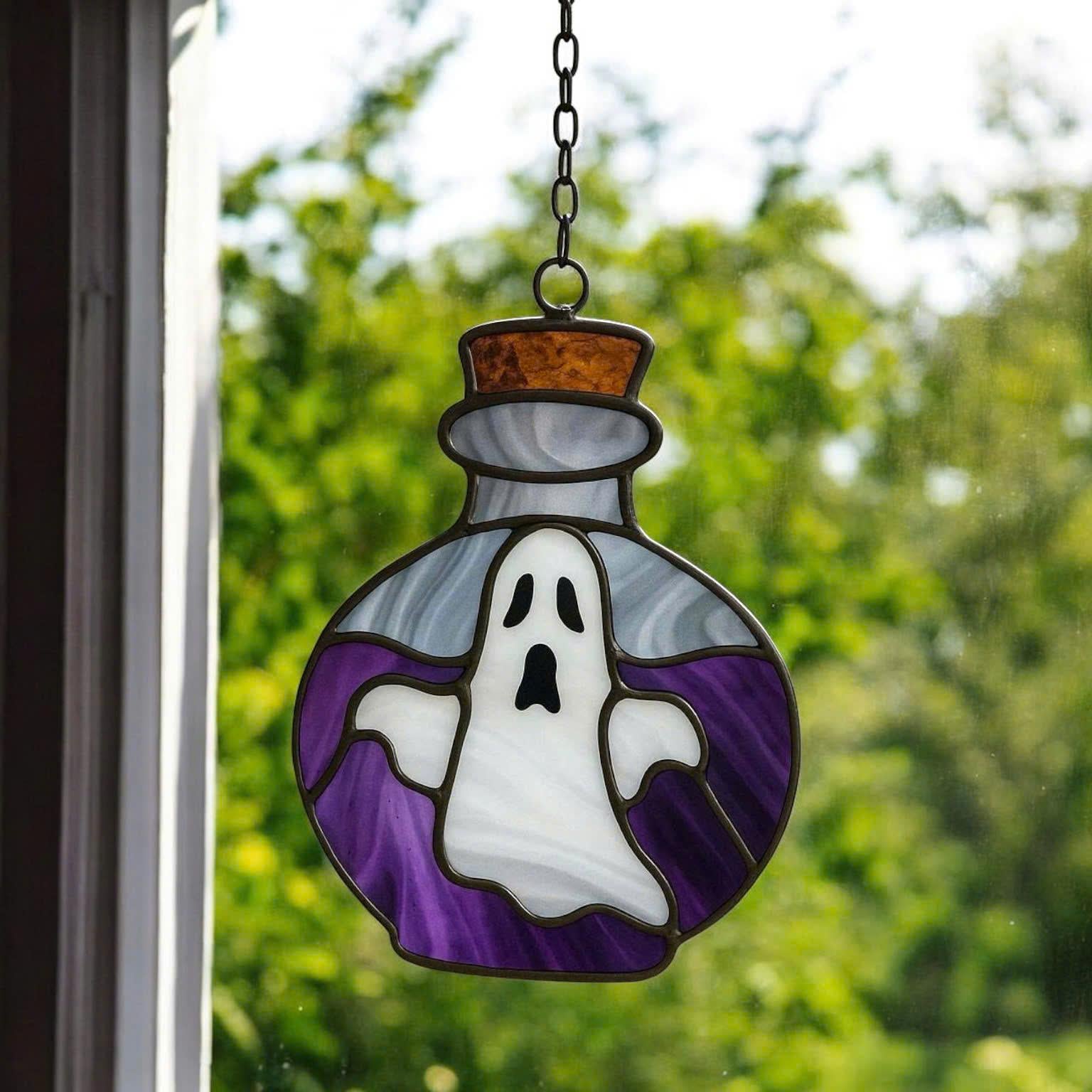 Purple stained glass potion bottle with white ghost inside, handcrafted Halloween window hanging home decor with copper top.
