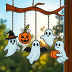 Halloween stained glass suncatcher with cute ghost and pumpkin hanging on branch window decoration.