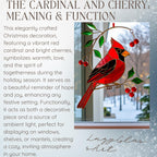 Stained glass cardinal with cherries, symbolizing warmth, love, and togetherness, displayed on a window with a snowy background.