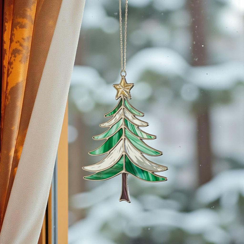 Stained glass Christmas tree (Style #3) hanging indoors, with light highlighting the textured glass pieces.