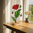 Close-up of a Stained Glass Poppy Birth Flower on wood base, a unique personalized gift for her.