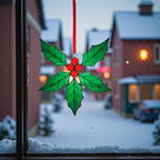 Christmas glass ornament glowing in window – handcrafted holiday home decor.