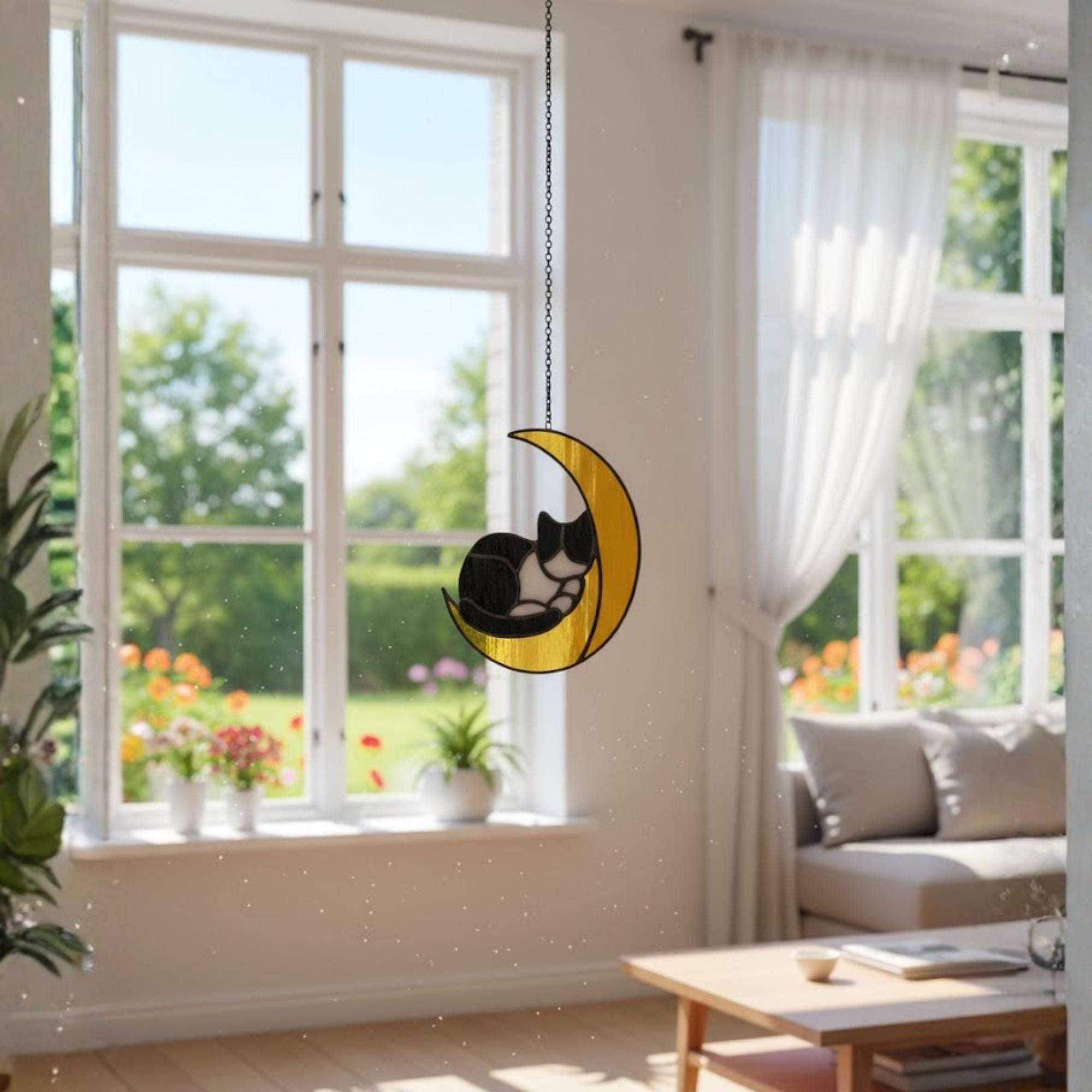 Couple exchanging handmade cat on the moon stained glass suncatcher, perfect gift for cat lovers