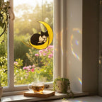 Cat on the moon stained glass suncatcher hanging in bright living room window, cozy home decor