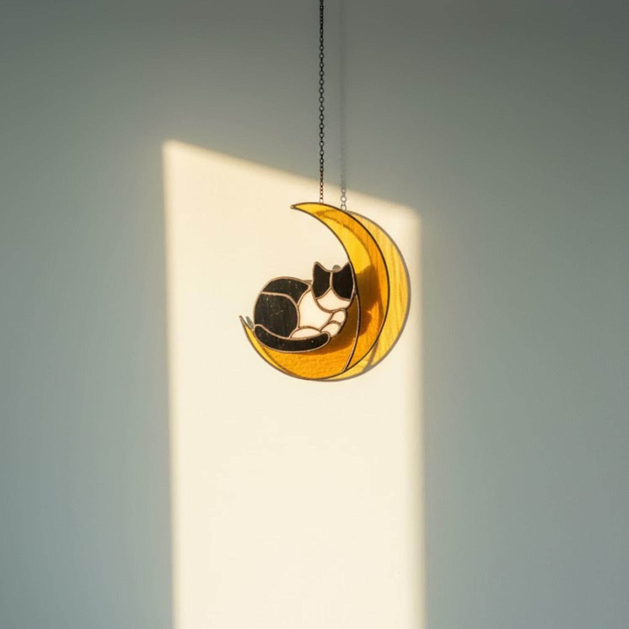 Product dimensions showing cat on the moon stained glass suncatcher height and width