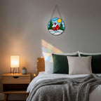 Handmade stained glass red cottage window hanging glowing softly, perfect cozy Christmas decor.