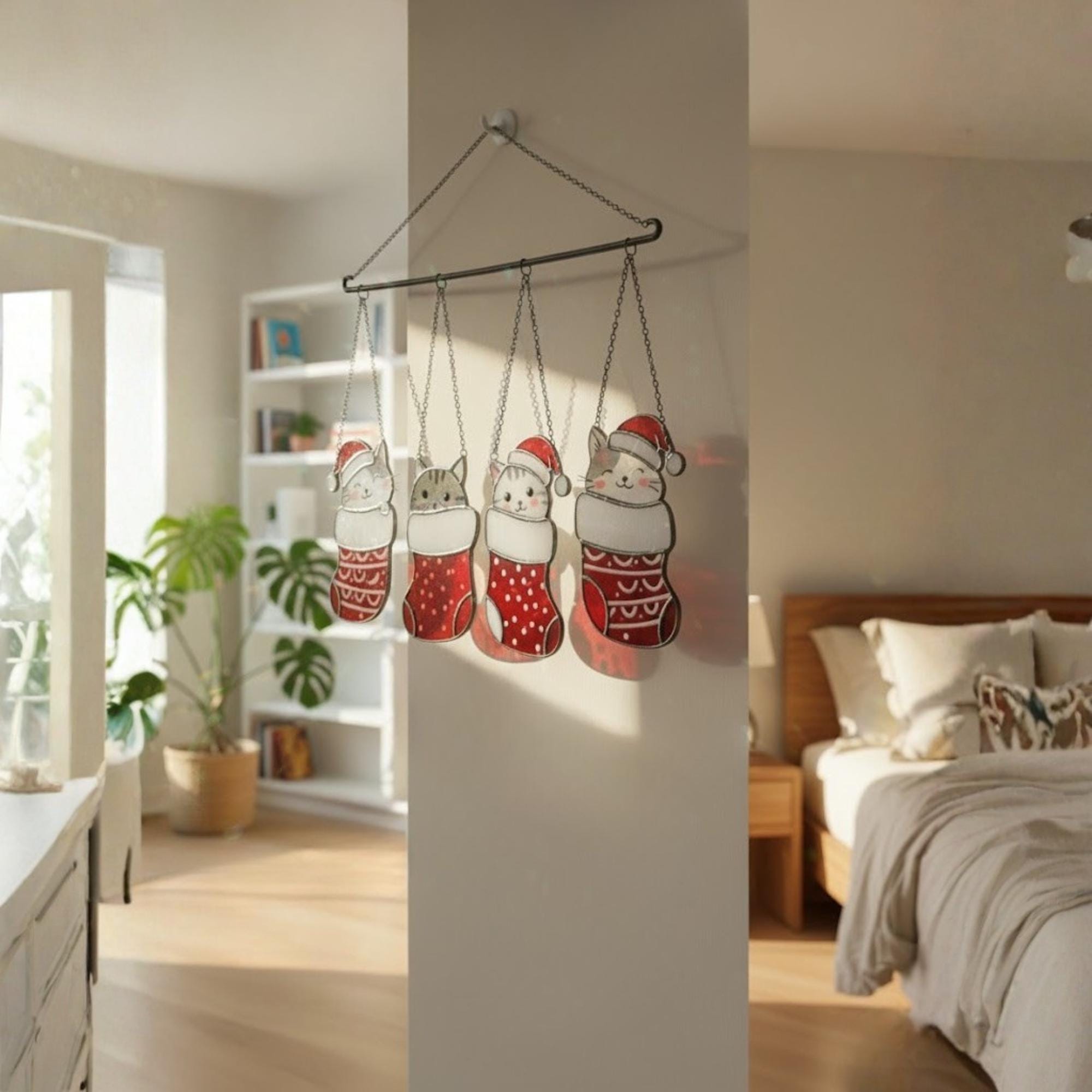Handmade stained glass Christmas cats hanging together on window, cute festive suncatchers.