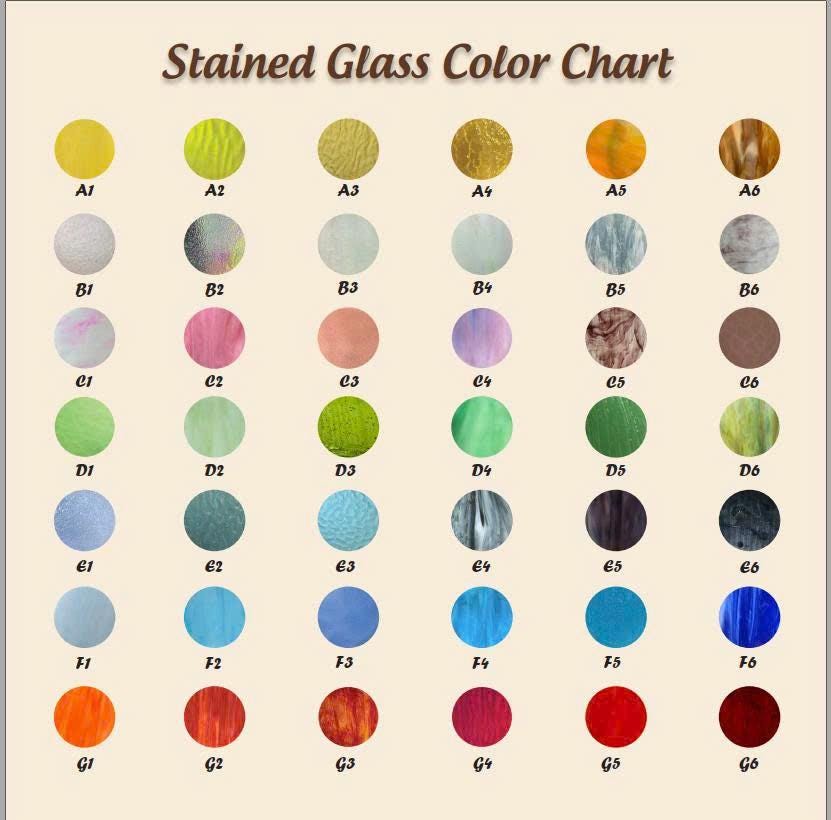 A collection of stained glass snowflake ornaments with unique colors, all beautifully arranged and ready for selection