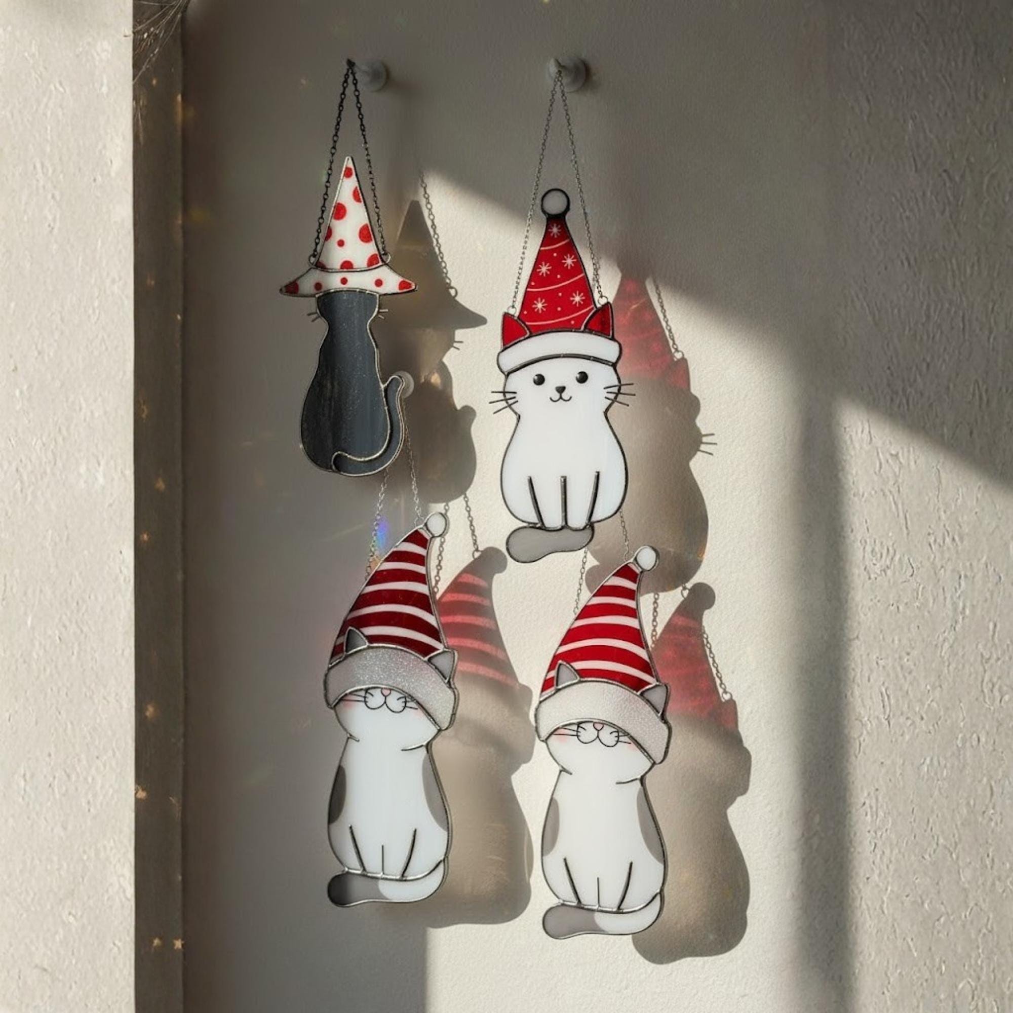 Christmas tree decorated with handmade glass cat ornaments – festive holiday decor gift.