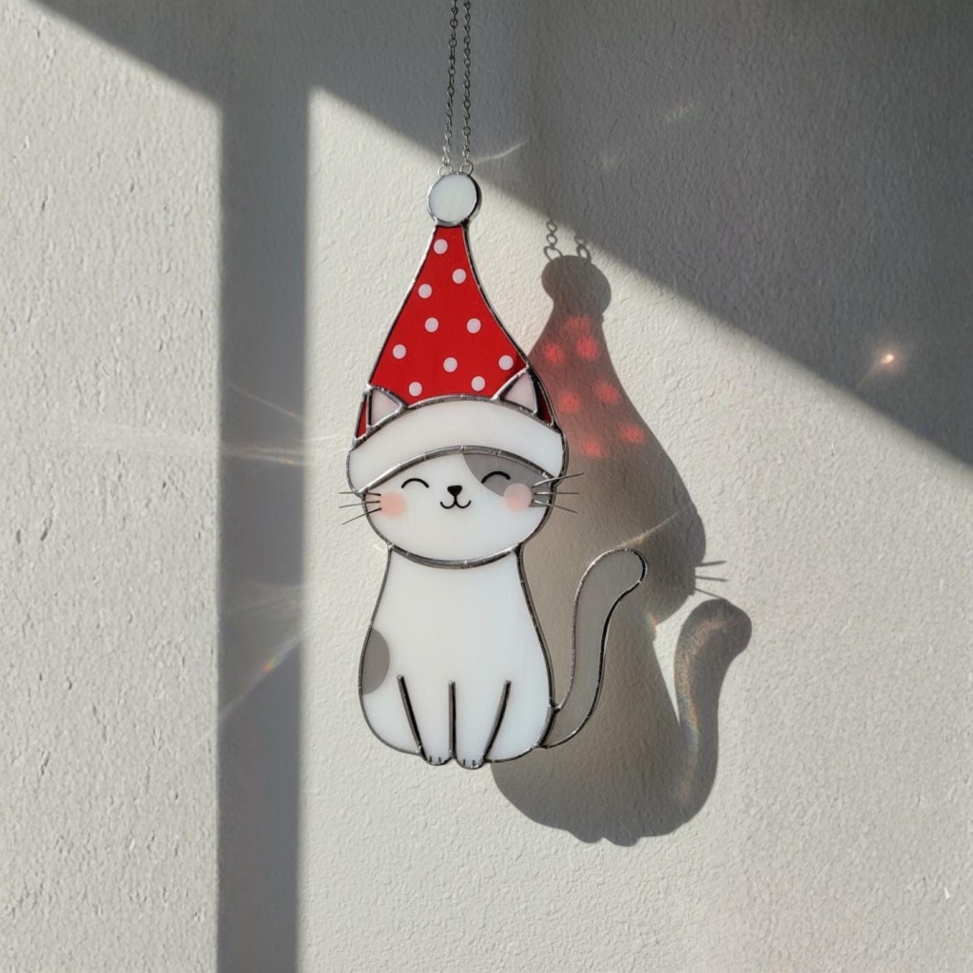 Single stained glass cat ornament glowing on wall – handmade pet lover home decoration.