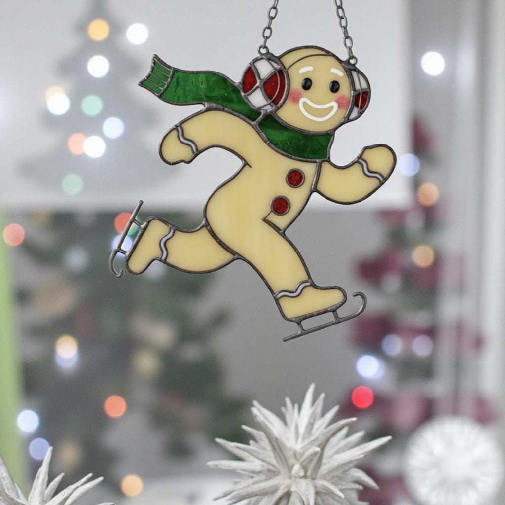 Gingerbread man stained glass ornament skating, handmade Christmas suncatcher.