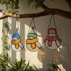 Trio of stained glass birds with hats and scarves – cozy handmade winter decor for home or garden.