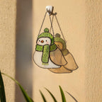 Green hat bird stained glass suncatcher – festive handmade window decoration idea.