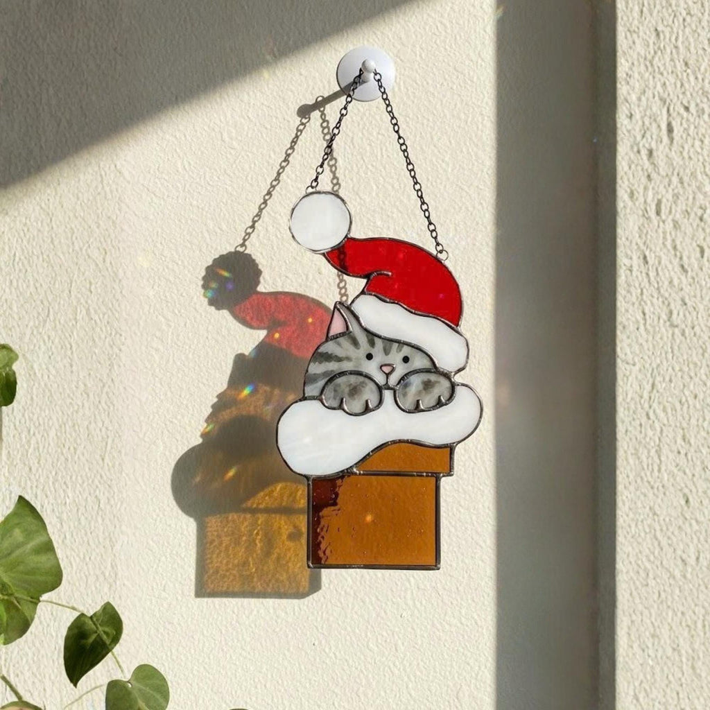 Handmade Christmas cat suncatcher stained glass ornament hanging on window, sunlight reflection holiday home decor gift for cat lovers