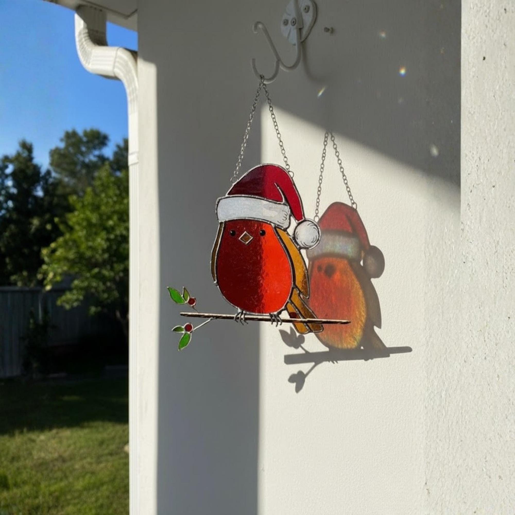 Multiple robins on patio door, sparkling window decor for sunshine rooms