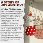 Story of joy and love card beside stained glass cat, cozy handmade Christmas gift inspiration.
