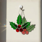 Large holly leaves and berries stained glass, festive winter decoration
