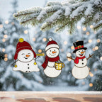 Handmade stained glass snowman ornaments on snow background – Christmas decor gift idea.