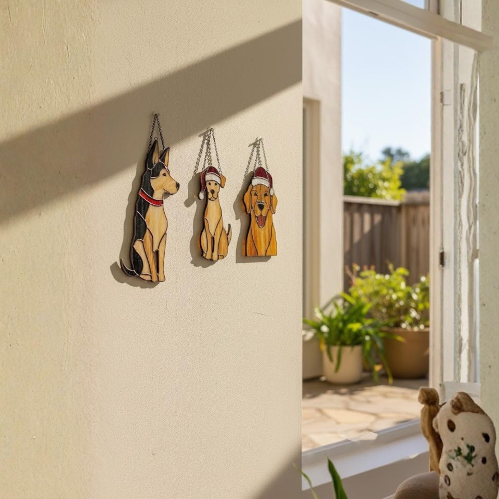 Pair of stained glass dog ornaments hanging on porch, Christmas dog decor