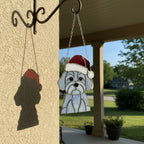 Dog suncatcher casting shadow on porch wall, handmade stained glass ornament