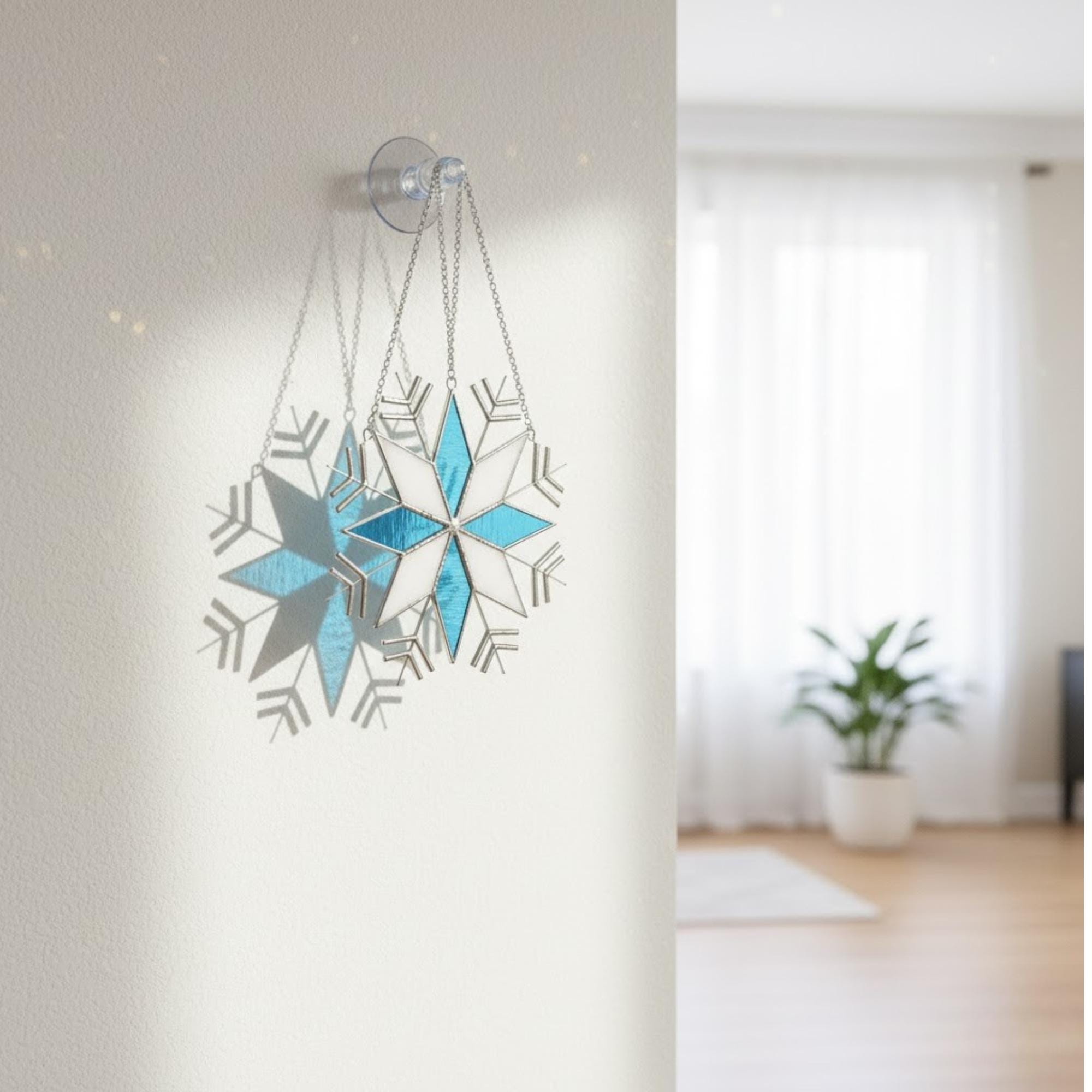 Close-up stained glass snowflake ornament with geometric pattern, winter decor