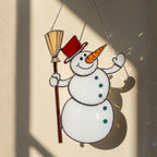 Cute stained glass snowman with orange scarf – handmade winter ornament decoration.