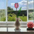 Pink stained glass tulip bouquet on bedside table – romantic handmade window decoration