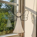 Small stained glass angel window hanging art with elegant transparent glass wings.