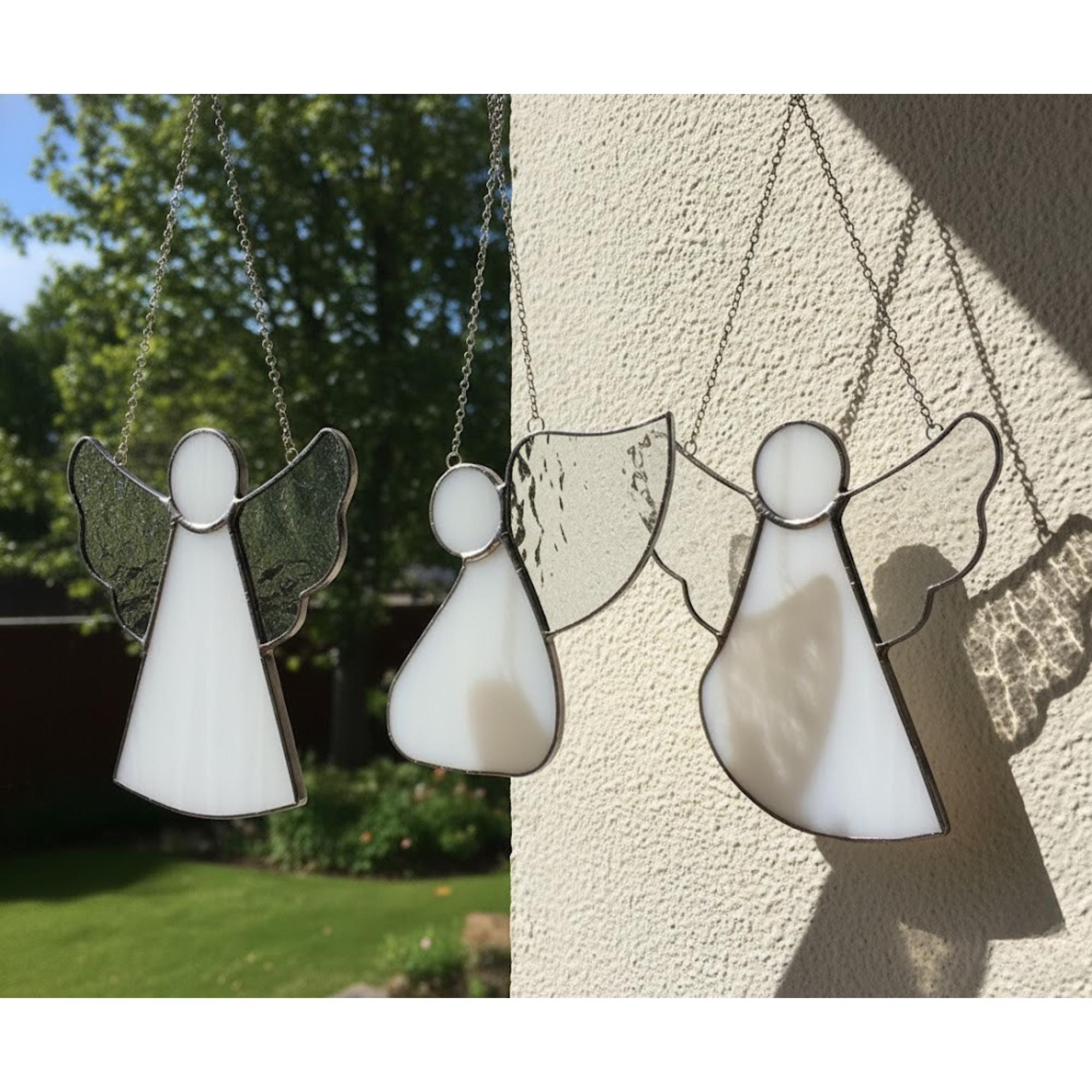 Iridescent angel window hanging art spreading warmth and light into cozy living space.