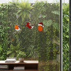 Robin bird ornament near garden view, nature inspired window hanging