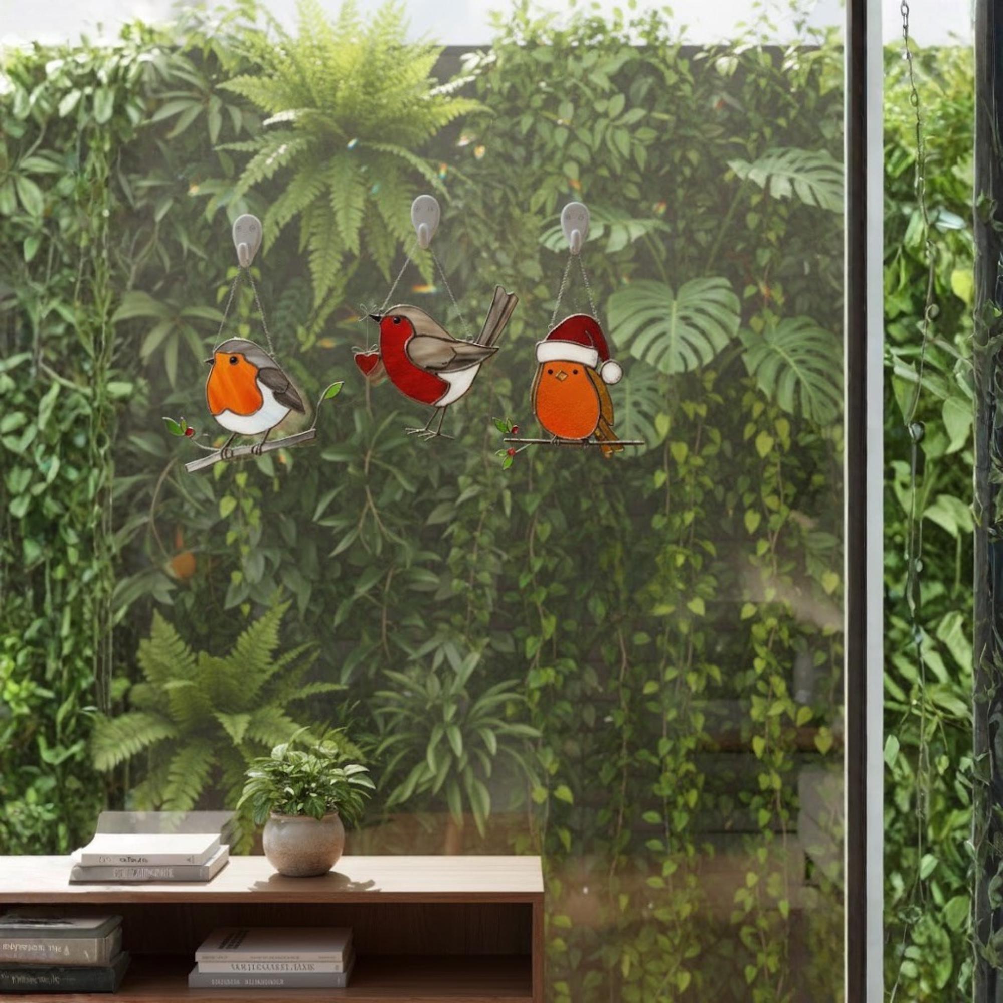 Robin bird ornament near garden view, nature inspired window hanging