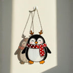 Smiling penguin with striped scarf, cozy holiday window suncatcher