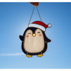 Two penguin ornaments together, antlers and scarf, Christmas home decor