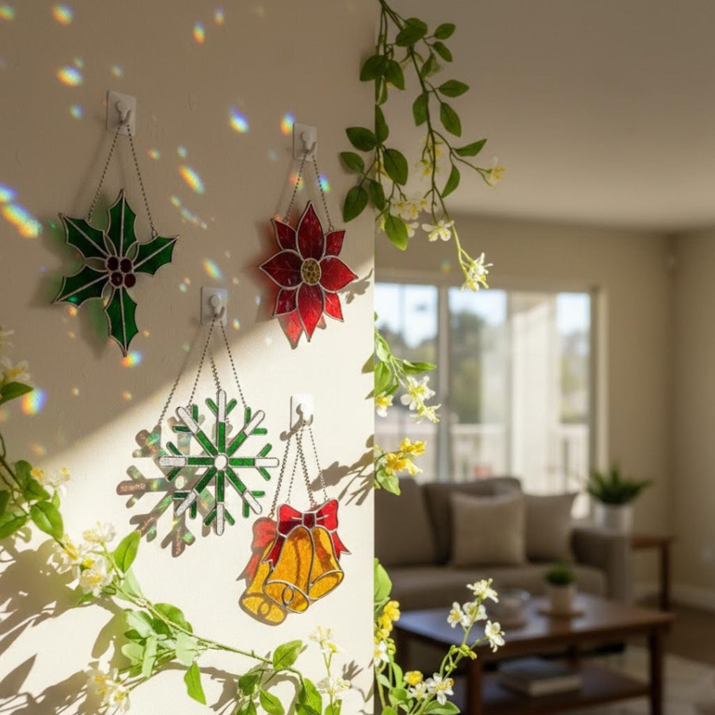 Poinsettia stained glass ornament near garland, handmade holiday decoration