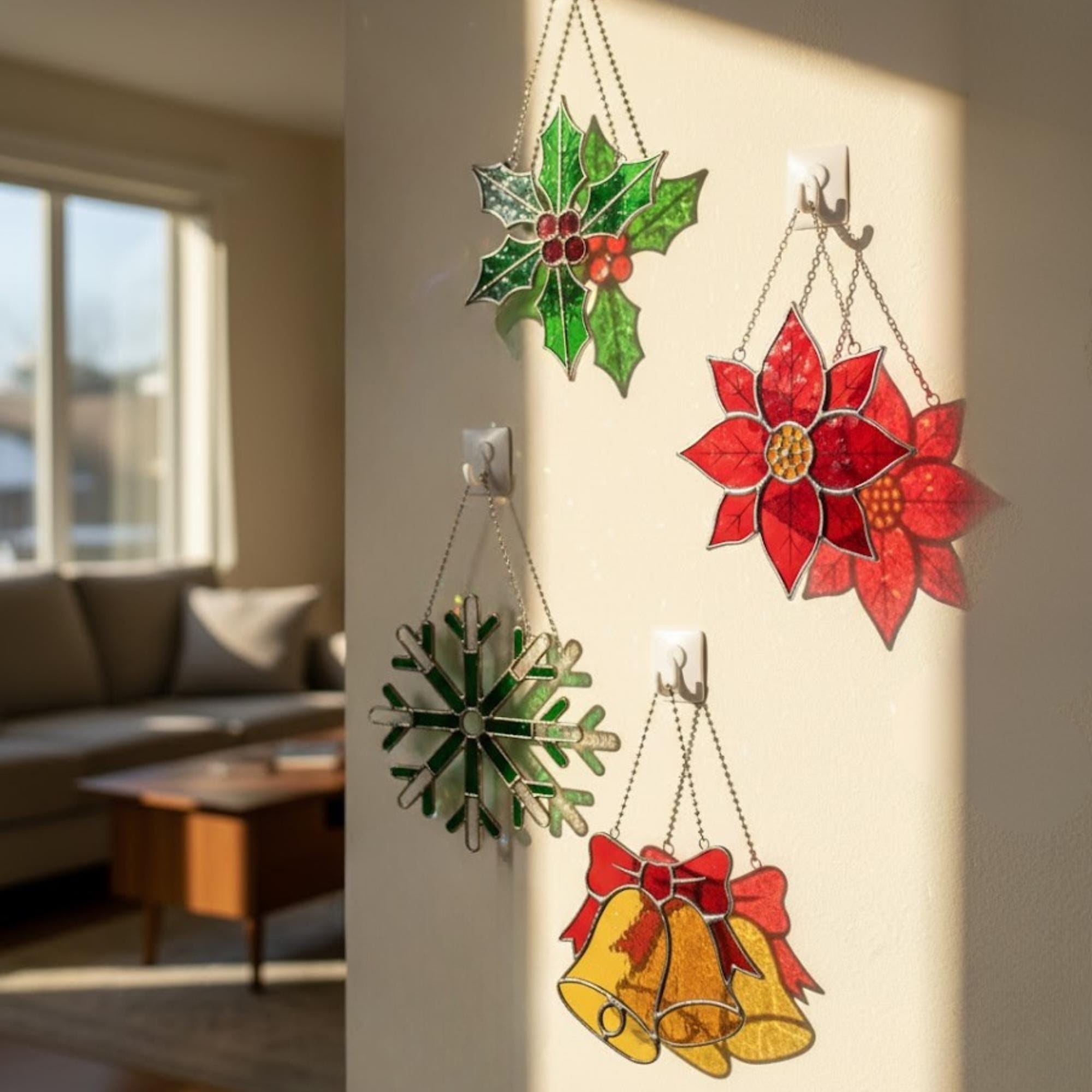 Window display with poinsettia snowflake and bells ornaments, cozy Christmas décor