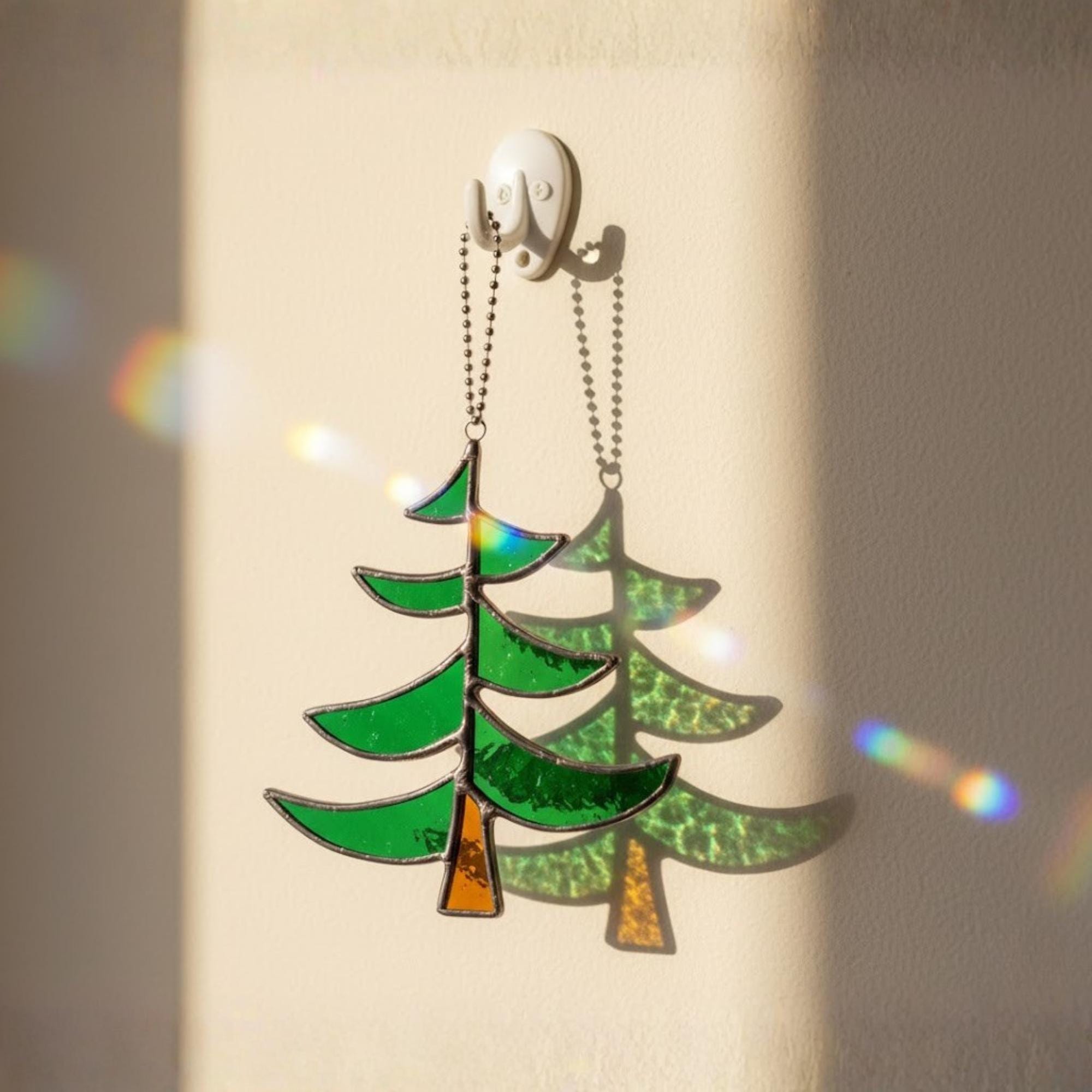 Layered green stained glass tree with star, handmade window suncatcher