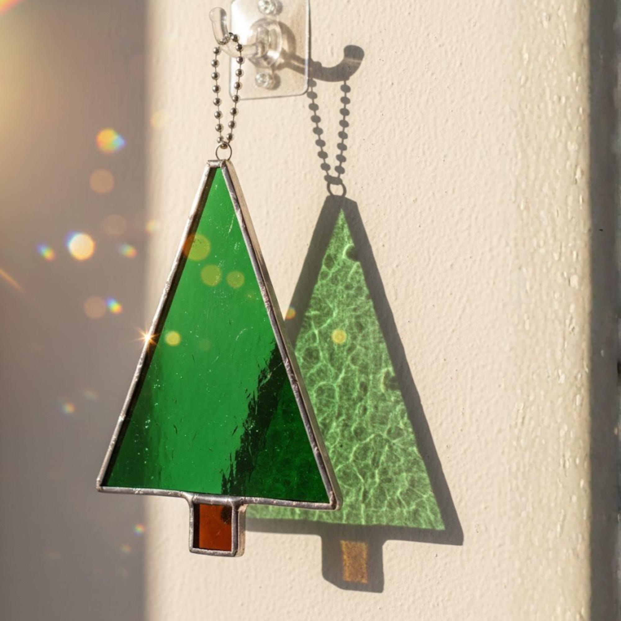 Modern curved branch stained glass Christmas tree design, holiday window decor