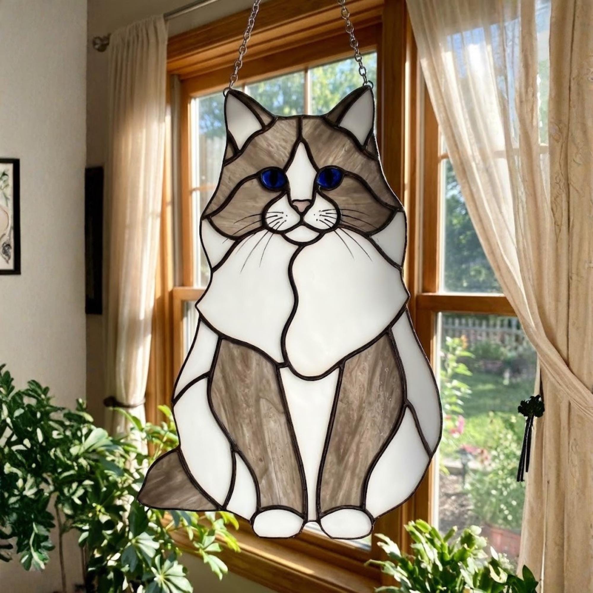 Fluffy brown and white cat suncatcher, long haired tabby cat ornament.