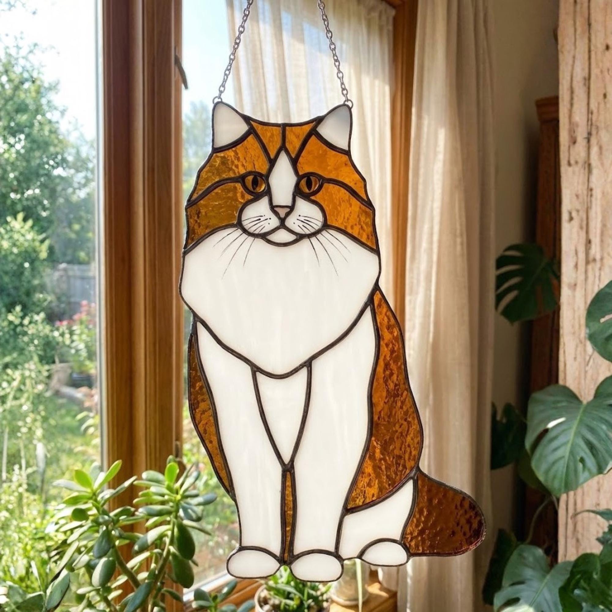 Orange and white Maine Coon or Calico cat stained glass suncatcher.