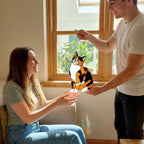 Stained glass Calico cat suncatcher with orange black and white patches, available in sitting and sleeping poses, window hanging or wood stand decor.