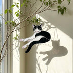 Stained glass Tuxedo cat suncatcher in black and white, available in funny lounging and sitting poses, window hanging or wood stand decor.