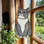 Stained glass Tuxedo cat suncatcher in black and white, available in funny lounging and sitting poses, window hanging or wood stand decor.