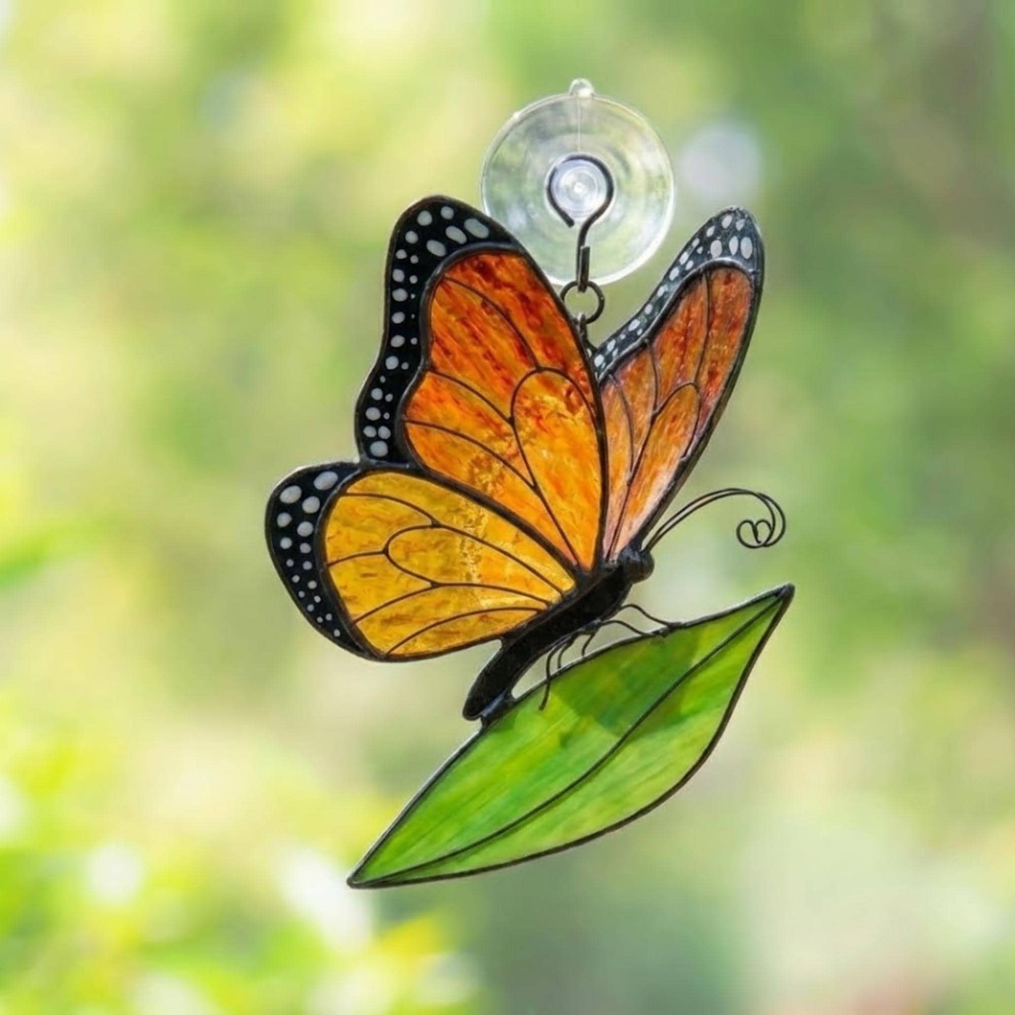 Stained glass monarch butterfly suncatcher, orange and black window hanging, nature lover gift, memorial ornament decor.