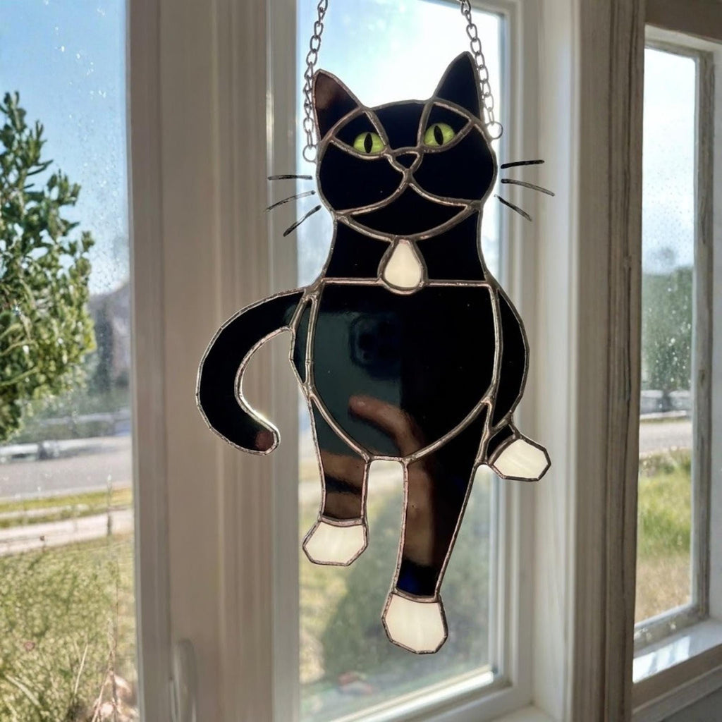 Stained glass Tuxedo cat suncatcher in black and white, available in funny lounging and sitting poses, window hanging or wood stand decor.
