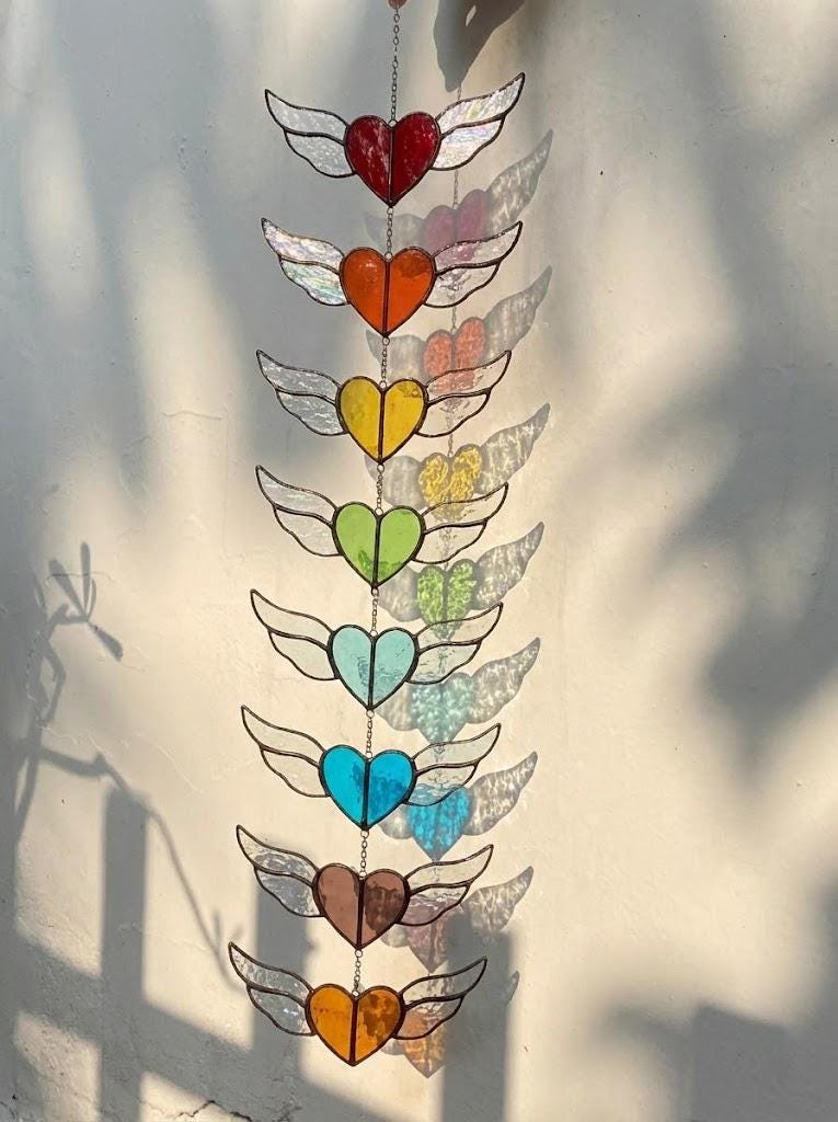Stained glass heart suncatcher with angel wings in 7 chakra rainbow colors, hanging window decor for healing and valentine gift.