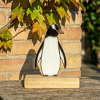 Stained glass penguin couple holding hands, romantic valentines day gift for her, cute animal suncatcher on wood stand.