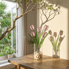 Pink stained glass tulip bouquet 3D flower stems held in hands as Mother's Day gift forever floral art casting colored shadows spring home decor handmade by LuzyGlassArt.